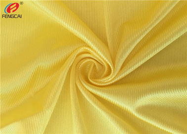 100 % Polyester Dazzle Fabric Sportswear Jersey Tricot Knit Fabric In Yellow Color